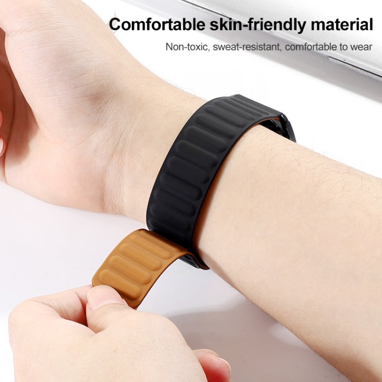 Silicone magnetic watch strap, black band worn on wrist