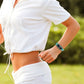 Teal transparent silicone integrated watch strap on wrist with watch face visible