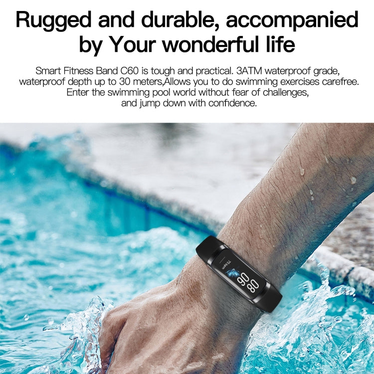 Black smart fitness tracker on wrist with color screen, splash-ready design