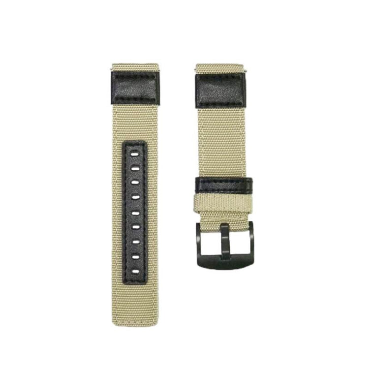 Khaki canvas watch strap with black end tabs, buckle, and adjustment holes