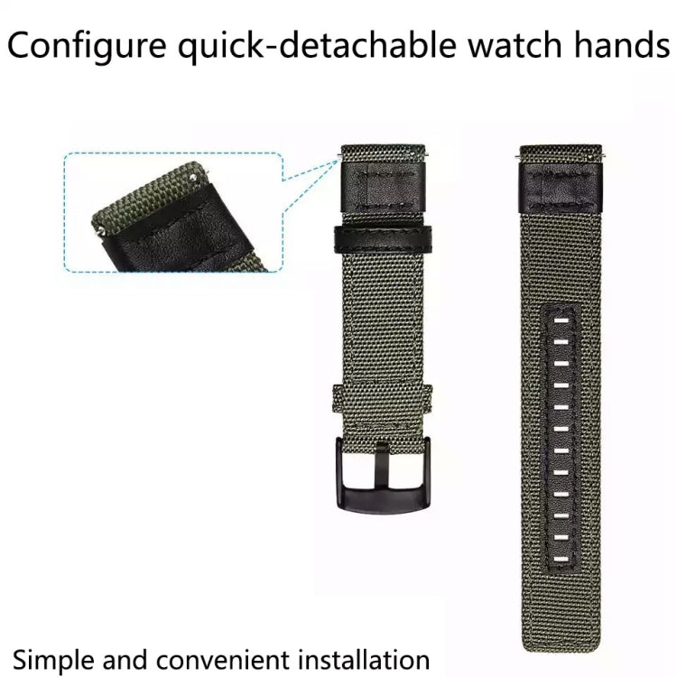 Khaki canvas watch strap with black top pad, metal buckle, and adjustment holes