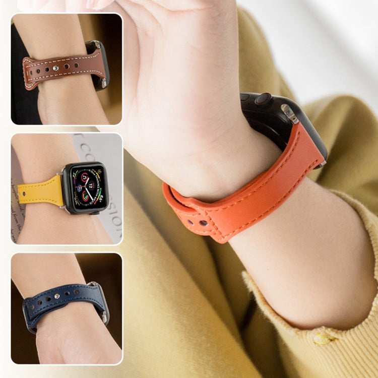 Orange microfiber leather watch strap on a wrist with a smartwatch