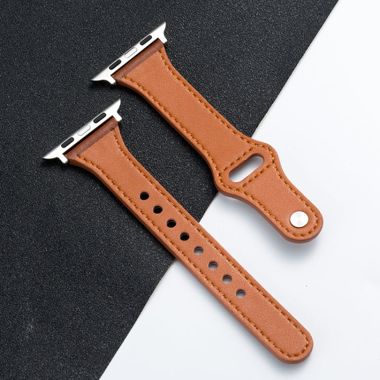Pair of brown microfiber leather watch straps with perforations and silver pin buckles
