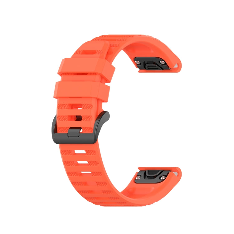Silicone sports watch strap with buckle, bright orange with dark gray accents.