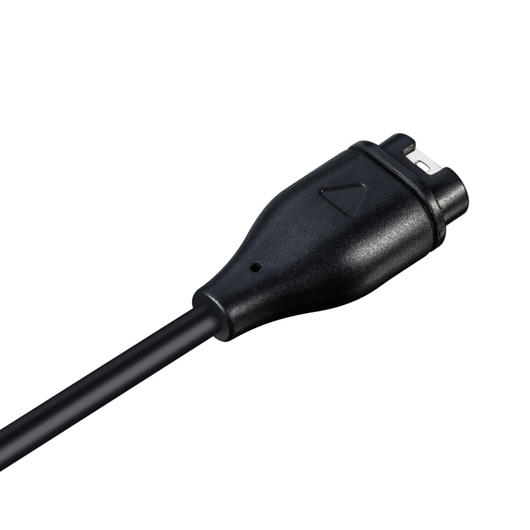 Smart watch charging cable for Garmin Fenix 7, close-up of black charging connector end.