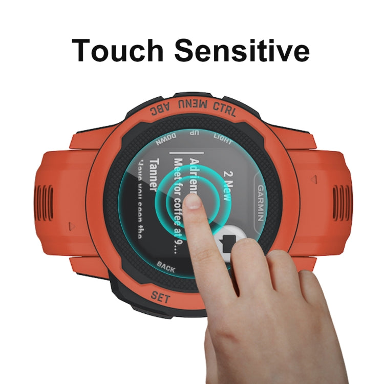 Touch sensitive tempered glass screen protector on orange Garmin smartwatch, finger swipe