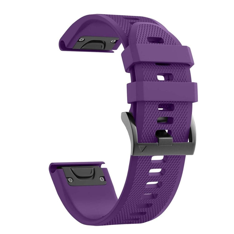 Purple silicone watch strap with textured surface and rectangular strap keeper