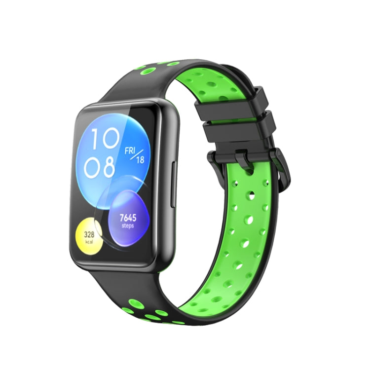 Two-tone green and black perforated silicone watch band with metal clasp