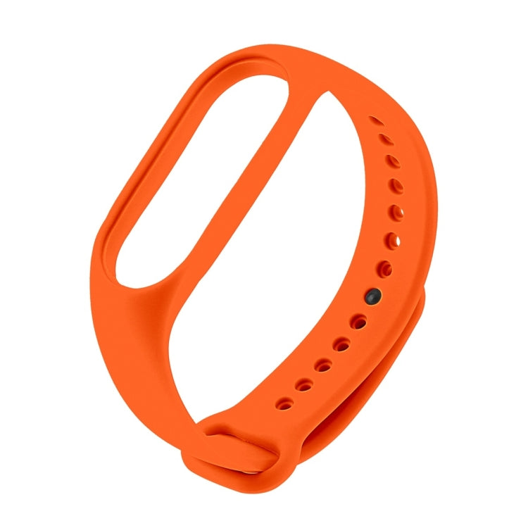 Orange TPU watch band with perforated strap and curved clasp