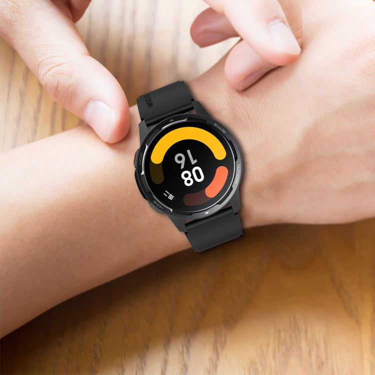 Silicone watch strap with silver buckle, black on wrist