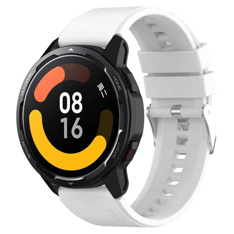 White silicone watch strap with silver buckle and clasp for smartwatch.