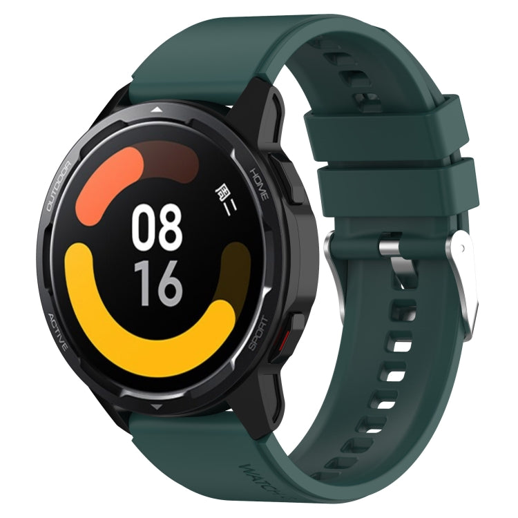 Silicone smartwatch strap with silver buckle, dark teal green band