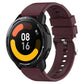 Burgundy silicone watch strap with silver protruding buckle and perforated band for smartwatch