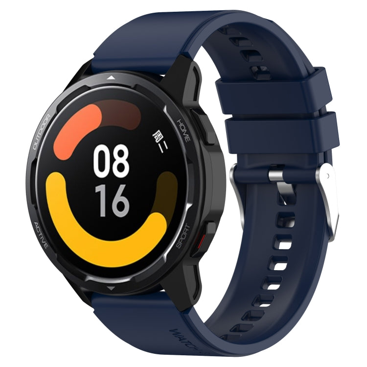 Navy blue silicone watch strap with silver protruding buckle and perforated band for smartwatch