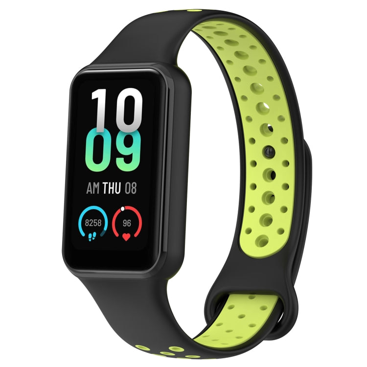 Two-tone silicone watch band in black and lime with smartwatch display visible.