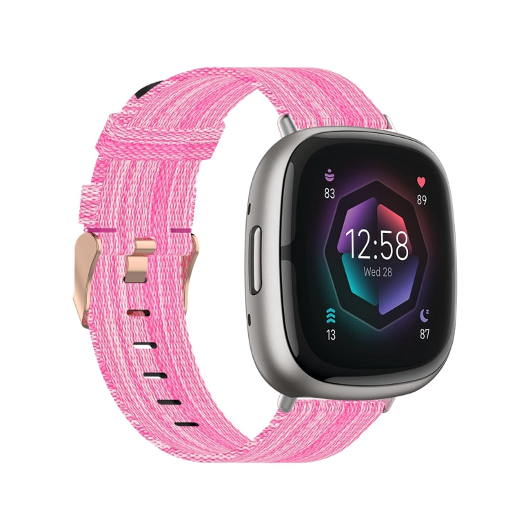 Nylon weave pink watch band with metal clasp and adjustable holes for Fitbit watch