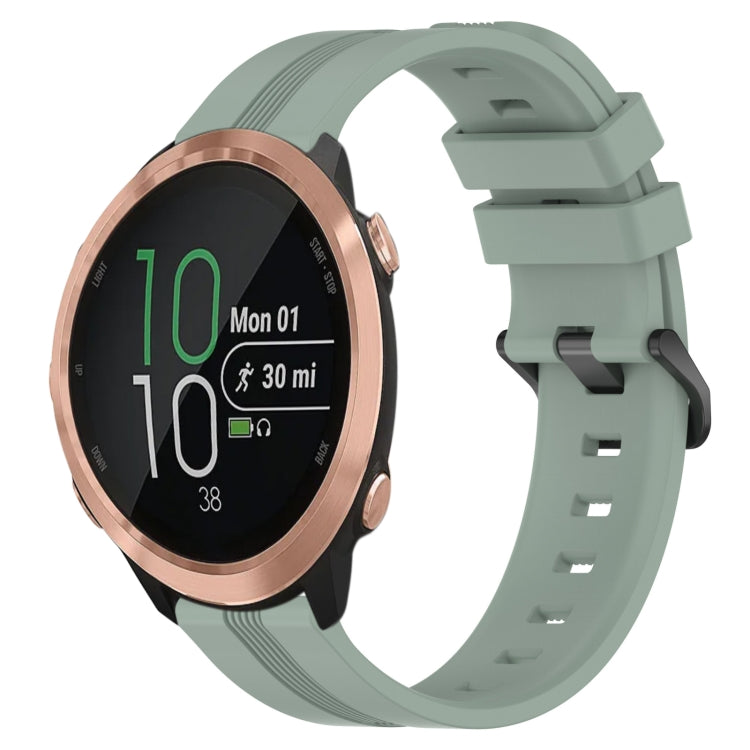Light green silicone watch band with concave striped texture and buckle clasp