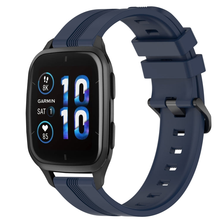 Concave striped silicone watch band in navy blue with buckle, worn on a black smartwatch