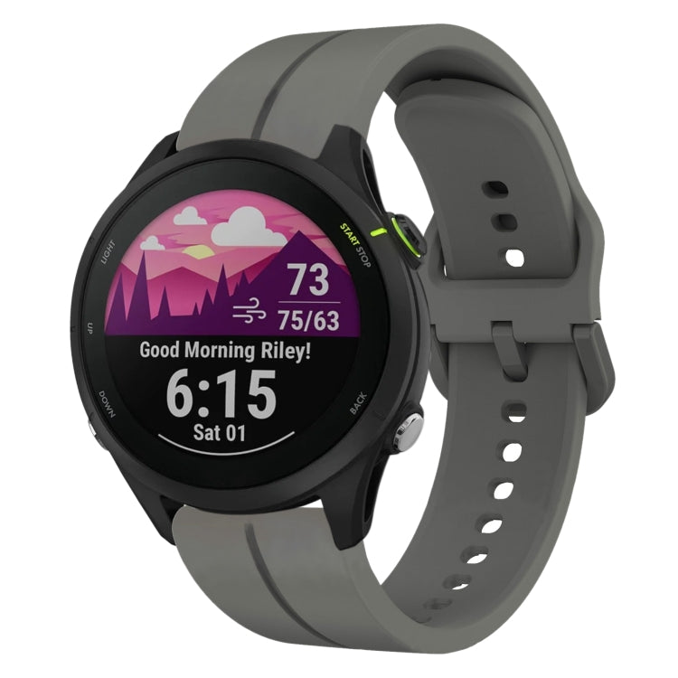Dark gray silicone loop watch band with perforated strap holes and pin buckle.