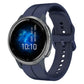 Blue silicone watch band with multiple holes and round metal smartwatch case