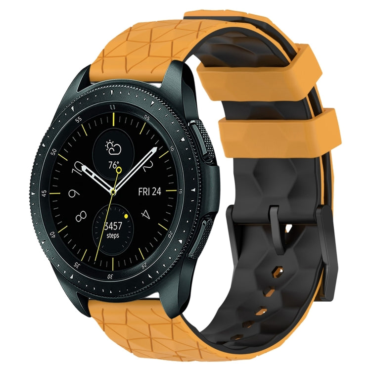 Two-color silicone watch band with geometric football pattern, orange and black