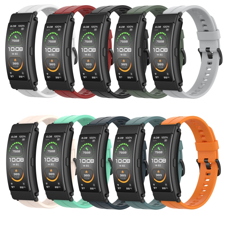 Assorted silicone watch bands lineup showing different colors and perforated straps