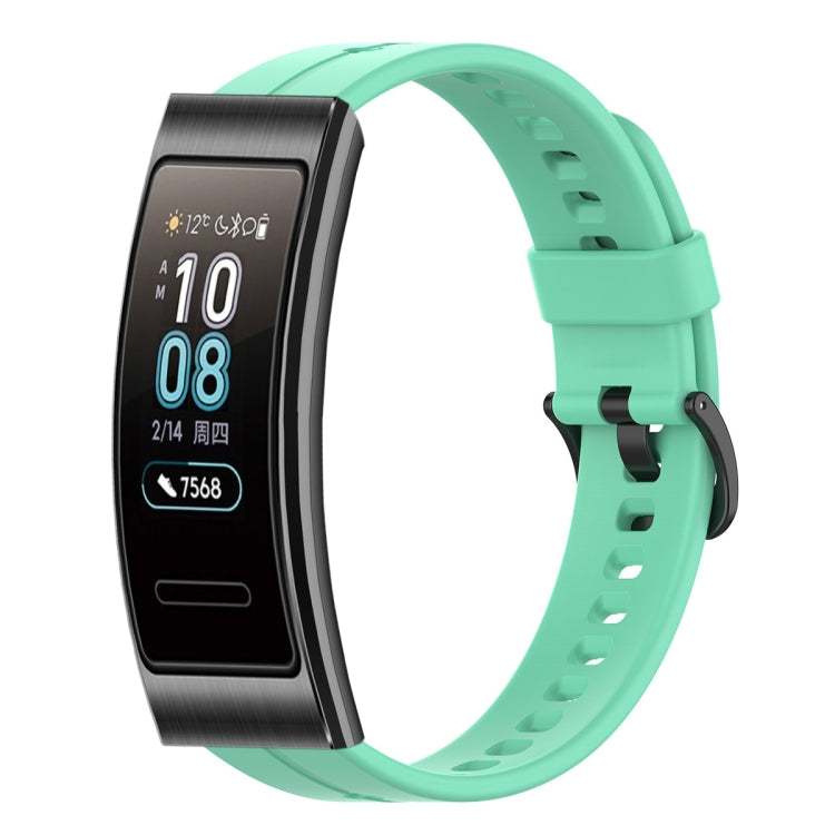 Mint green silicone watch band with adjustable pin buckle and perforated strap
