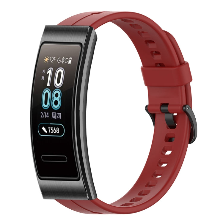 Red silicone watch band side profile with metal clasp and vented holes