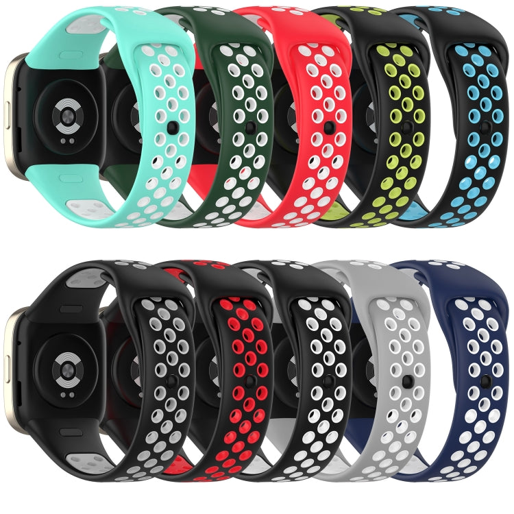Assorted two-color silicone watch bands with perforated dotted pads in teal, red, blue, and black