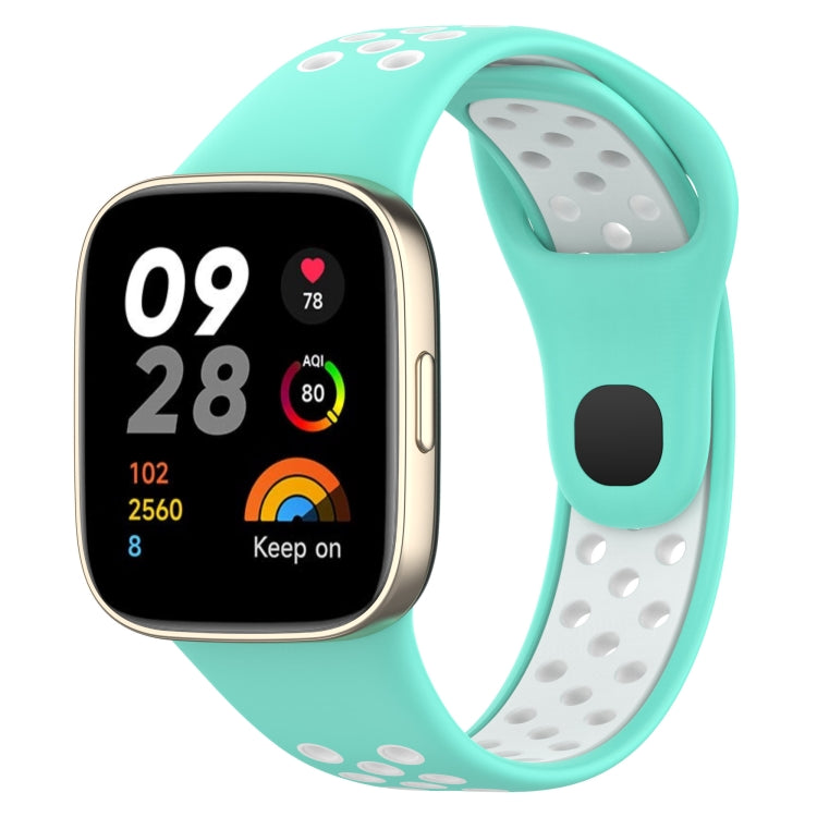 Two-tone silicone watch band, teal outer with white perforated backing and dark fit tab
