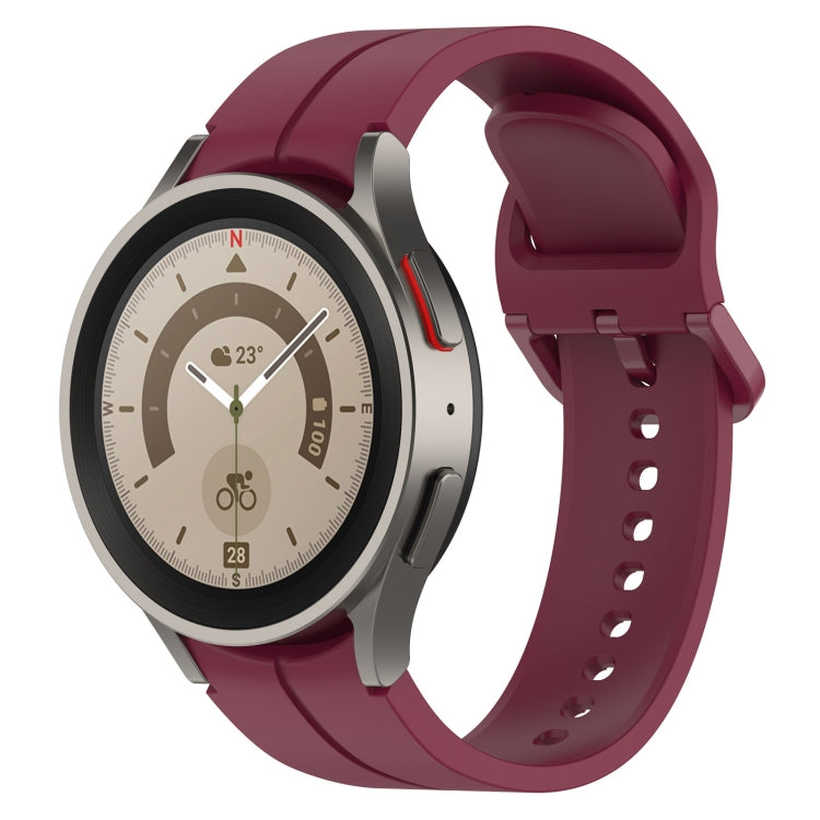 Grooved silicone watch band with buckle and perforations, wine red