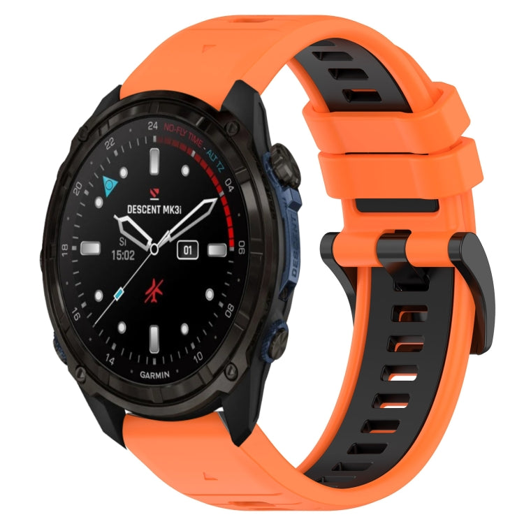 Two-color silicone watch band, orange outer band with black inner strap and buckle.