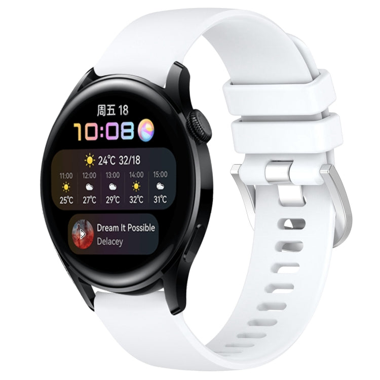 White silicone watch band with silver-tone buckle and adjustable vented strap holes