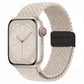 White woven nylon magnetic fold watch band with multicolor fleck and black buckle clasp