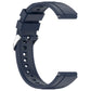 Navy silicone watch band close-up with buckle clasp and strap holes