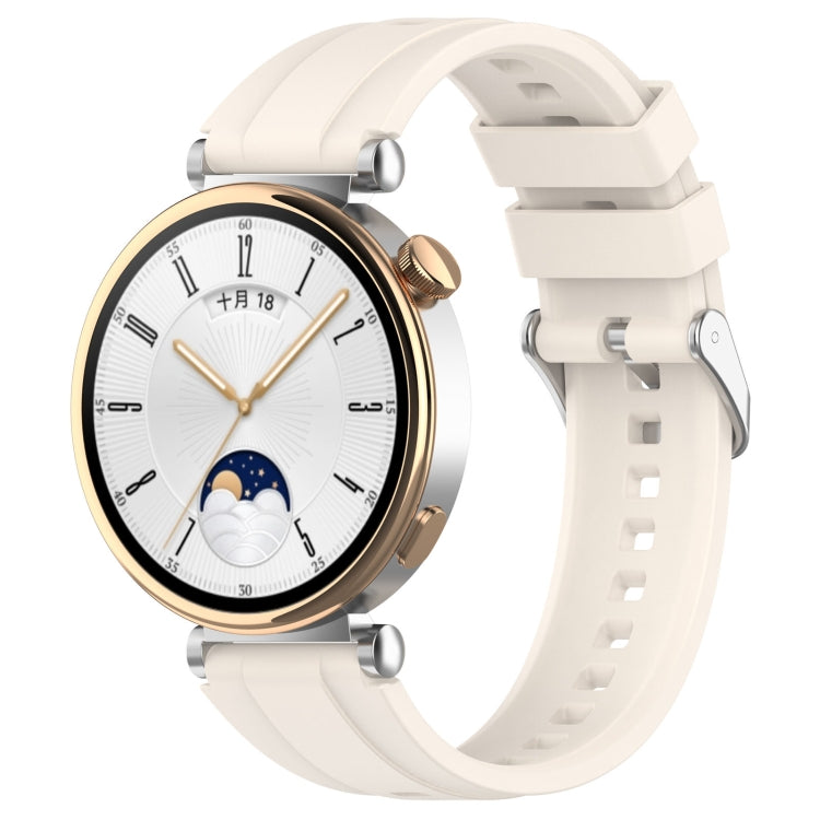 White silicone watch band with silver buckle and adjustment holes