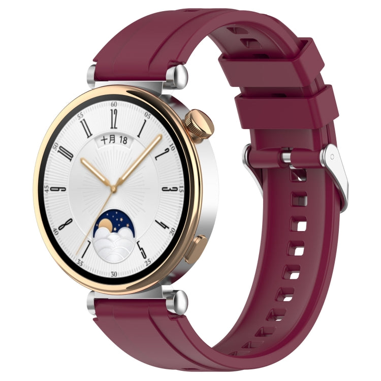 Silicone watch band with silver buckle, burgundy red.