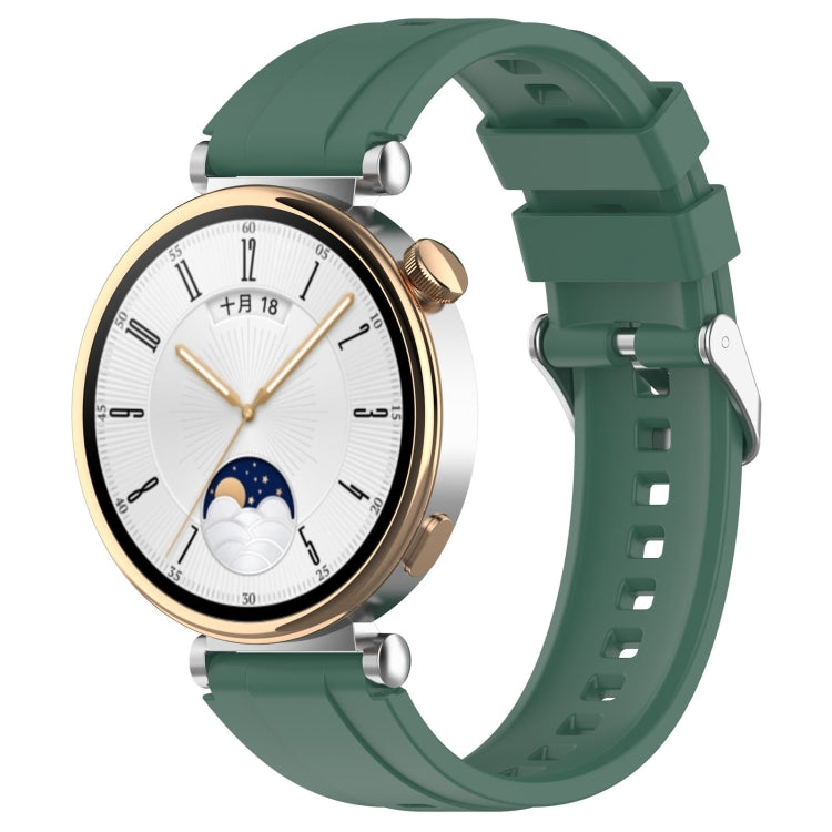 Silicone watch band with silver buckle, dark green.