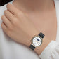 Black silicone watch band on wrist with metal buckle