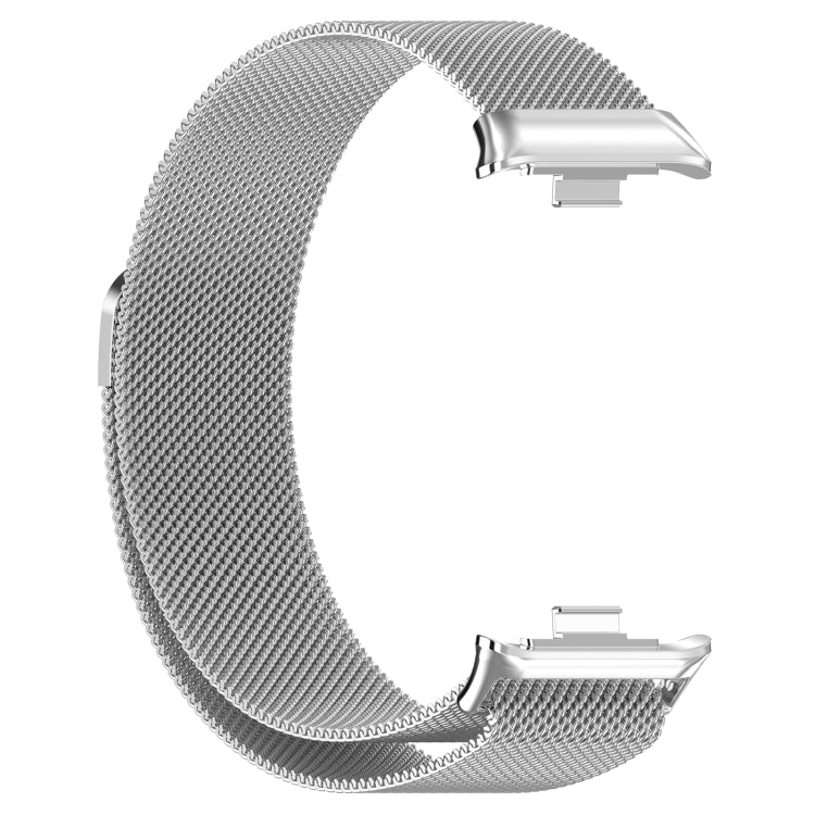 Magnetic steel mesh watch band in silver tone with metal clasp