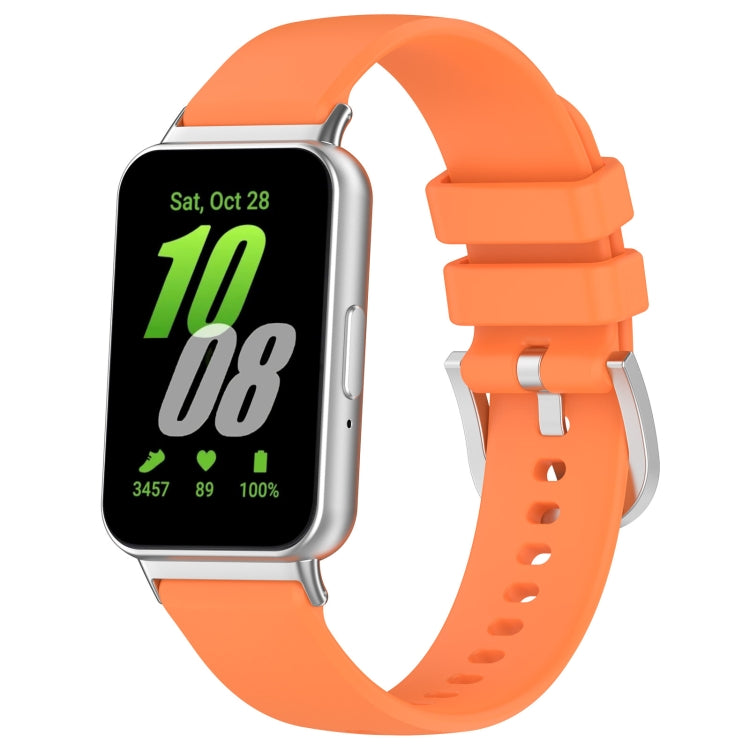 Orange glossy silicone watch band with metal connectors and perforation holes