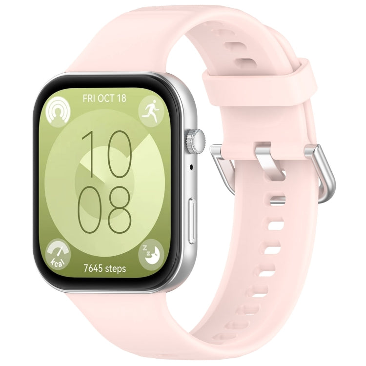 Pale pink silicone sports watch band with silver buckle, shown fitted to a watch