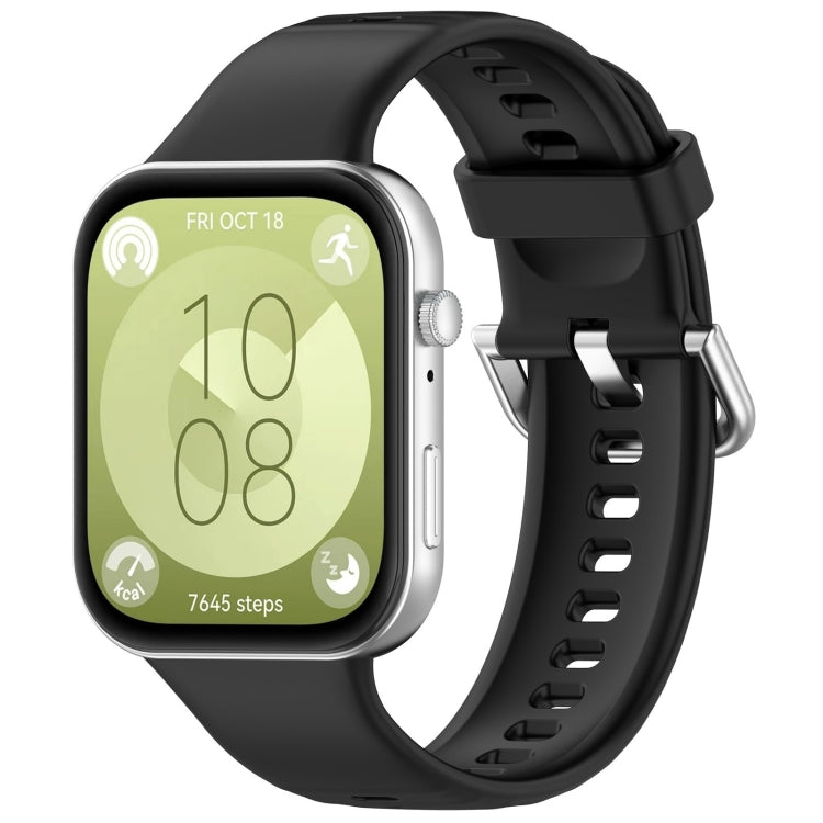 Black silicone sports watch band with silver buckle, shown fitted to a watch