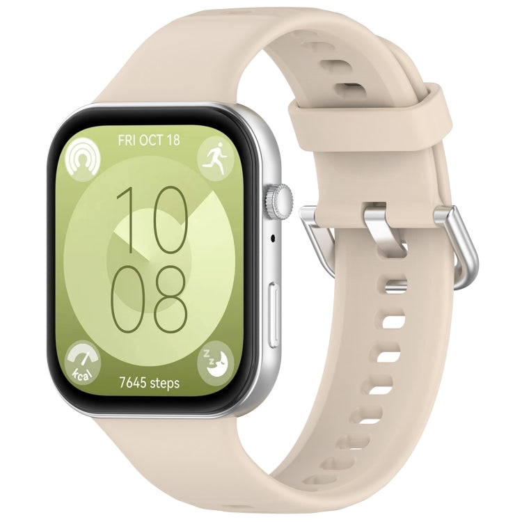 Ivory silicone sports watch band with silver buckle, shown attached to a smartwatch.