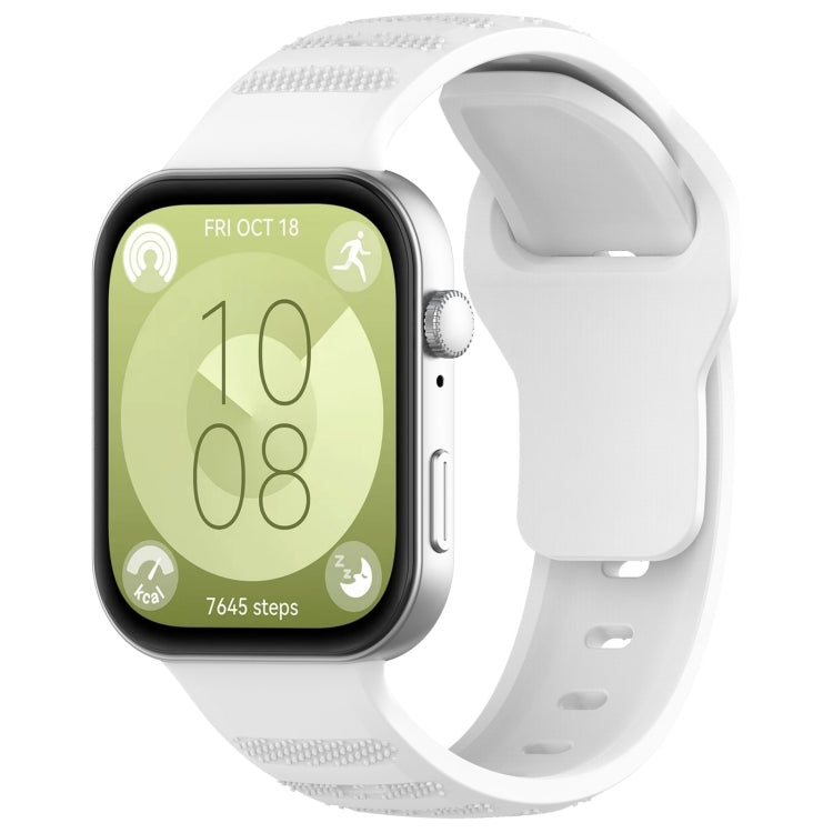 White silicone sports watch band with textured grip sections, shown attached to a smartwatch.