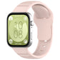 Pale pink silicone sports watch band with perforated texture, shown on a smartwatch.