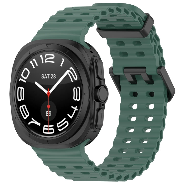 Dark green silicone watch band with ventilated holes and dual buckle, shown on a smartwatch
