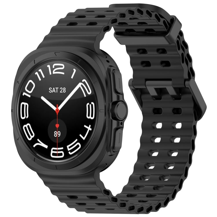 Black silicone watch band with ventilated holes and dual buckle, shown on a smartwatch