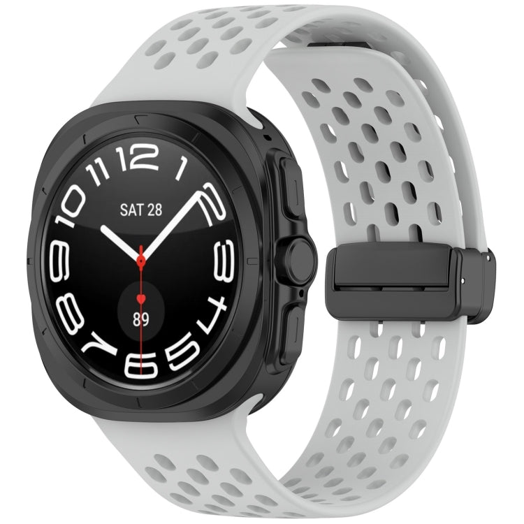 Light gray perforated silicone watch band with magnetic folding buckle, shown on a smartwatch