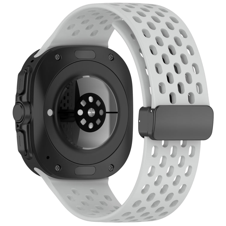 Light gray perforated silicone watch band with magnetic buckle, shown from the back on a smartwatch